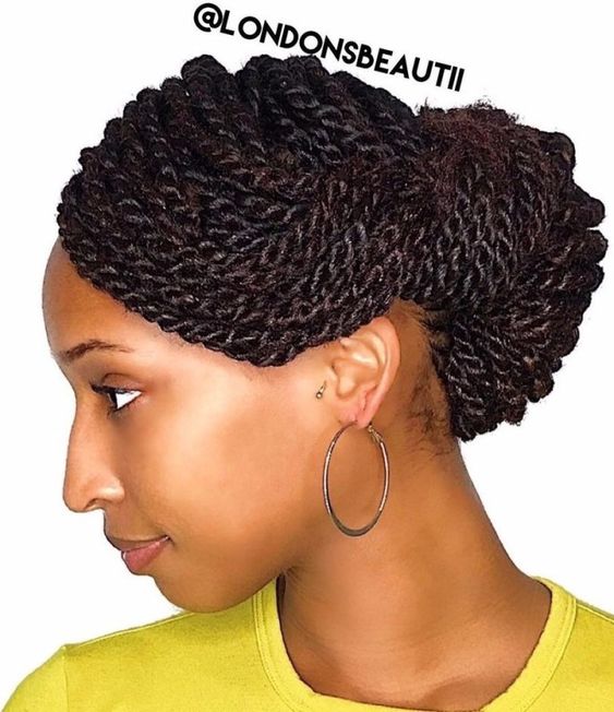 black girl hairstyles twist with low buns two buns