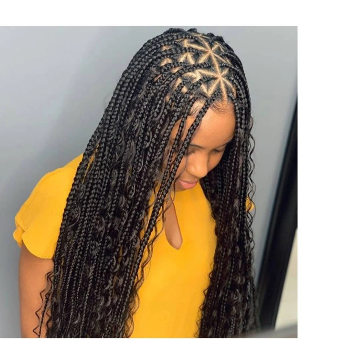 large knotless braids with curls